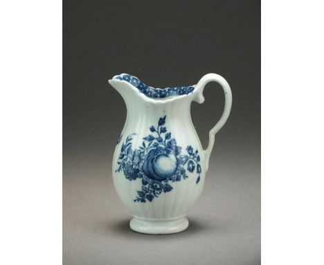 A Caughley milk jug transfer-printed with the Apple and Damson pattern within a cell border, circa 1778-85, S mark, 9.8cm hig