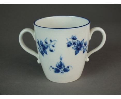 A Caughley two-handled cup painted with the Bright Sprigs pattern, circa 1785, with a single blue line to the upper rim, S ma