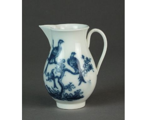 A Caughley sparrow beak milk jug transfer-printed in the Birds in Branches pattern, circa 1785, C mark, 9.5cm high (kiln mark