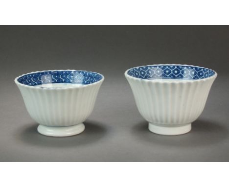 Two Caughley reeded tea bowls with internal cell diaper borders, circa 1778-85, one with C mark, the second unmarked though f