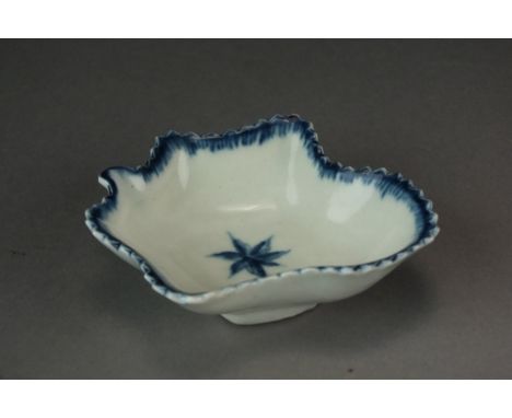 A Caughley pickle leaf dish painted with a Single Flowerhead, circa 1780, unmarked, overall width 7.5cmProvenance: Mrs B.M Gr