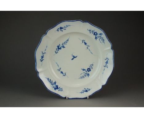 A Caughley tureen stand painted in blue with the Chantilly Sprig pattern, circa 1785-92, S mark, 27.5cm diameter (filled chip