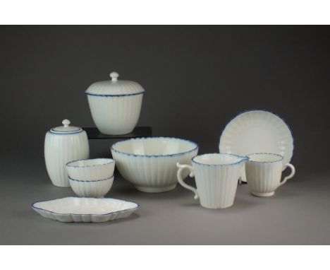 A small collection of Caughley blue edged border wares, circa 1776-80, comprising a tea bowl, coffee cup, a saucer, a milk ju