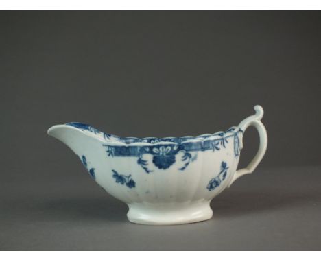 A Caughley reeded sauce boat, transfer-printed in the Chrysanthemum pattern, with splayed foot, kinked handle and curled thum