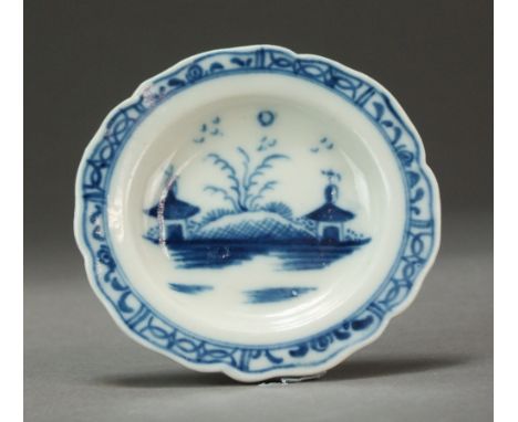 A very rare Caughley toy dinner service dish painted in the Island pattern, circa 1780-90, with an associated segmented borde