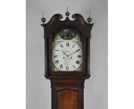 An early 19th century oak eight day longcase clock, the 14 inch arch enamel dial signed W Devey, Dudley with centred subsidia