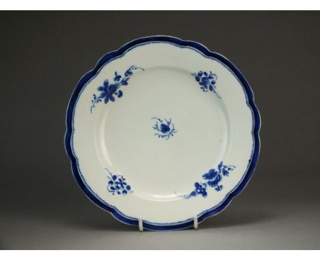 A Caughley plate painted with Sprigs, circa 1785-90, S mark, 21cm diameterProvenance: Wright Collection no.1000.