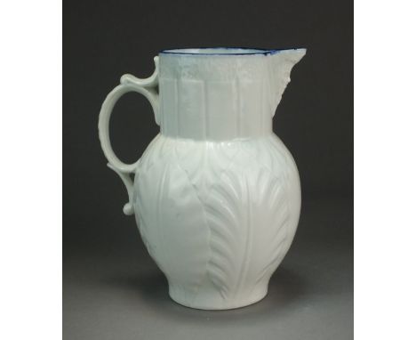A Caughley cabbage-leaf mask head jug, circa 1790-95, decorated with a single-blue edged border, otherwise plain, S mark, 10.