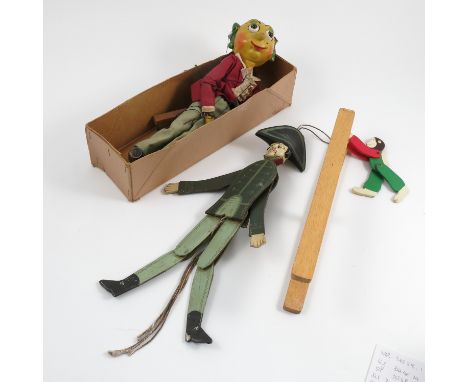 A boxed Pelham puppet, Mr Turnip, together with a painted wooden model of a man wearing a bicorn hat, with pull string to mov