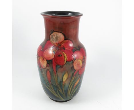 A Moorcroft Pottery vase, decorated in the Freesia pattern, height 12.5ins Condition report: Good condition