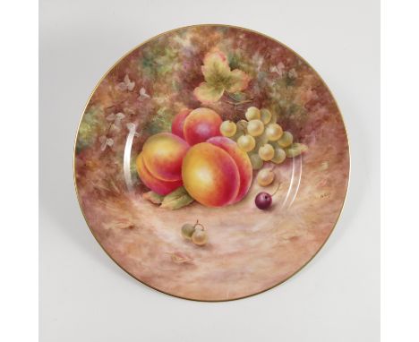 A Royal Worcester plate, decorated with fruit to a mossy background by B Cox, diameter 10.5ins Condition report: Minor scratc