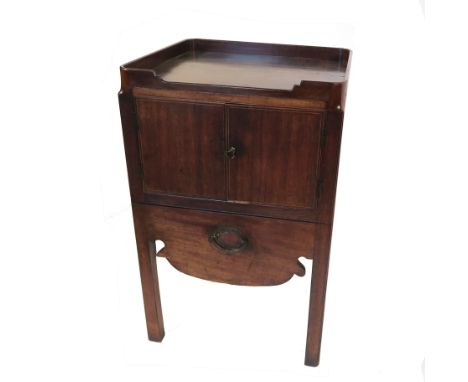 A Georgian mahogany bedside commode, with tray top, having two cupboards below with pull out commode compartment, width 22ins