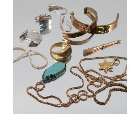 A collection of non-precious metal jewellery, comprising a ring, a turquoise matrix pendant on chain, a pair of cufflinks, a 