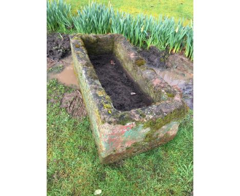 A rectangular stone garden trough, 27ins x 16ins