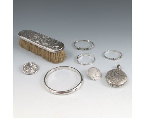 A 19th century silver button, of circular form engraved with initials, diameter 1.25ins, together with another silver button 