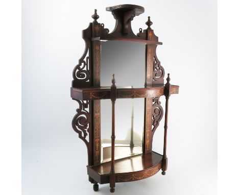An Edwardian rosewood set of wall shelves, with mirror back, decorated all over with inlaid satinwood, overall height 28ins C