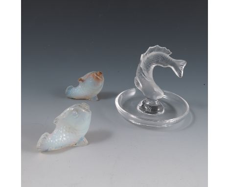 A Lalique France glass dish ring, the centre with Koi carp, height 3.75ins, together with a pair of opaque glass bottles form