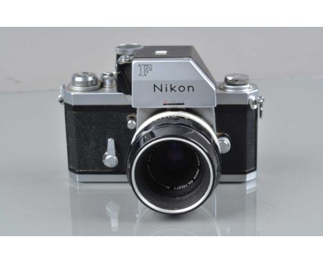 A Nikon F Photomic FTN SLR Camara, serial no 7455274, shutter working, self timer working, meter responsive, body G, light we