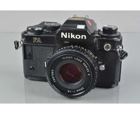 A Nikon FA SLR Camera, black, serial no 5345246, shutter working, meter responsive, self timer working, body G, light wear, w