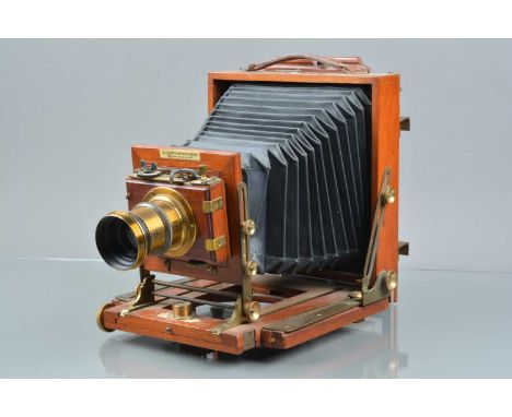 A Lancaster &amp; Son ''The Instantagraph'' Half Plate Mahogany and Brass Camera,  some dulling to brass, body G, bellows G, 