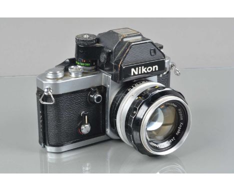 A Nikon F2 SLR Camera, serial no 7608358, shutter working, self timer working, with DP-2 finder, meter responsive, body F-G, 