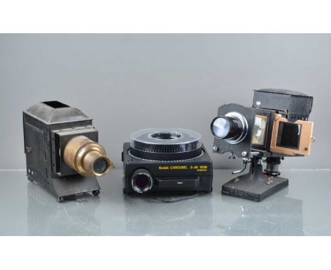 A Group of Slide Projectors, including an Ensign No 6 Optiscope, a Magic lantern body with brass lens, an E.P. 35mm film stri