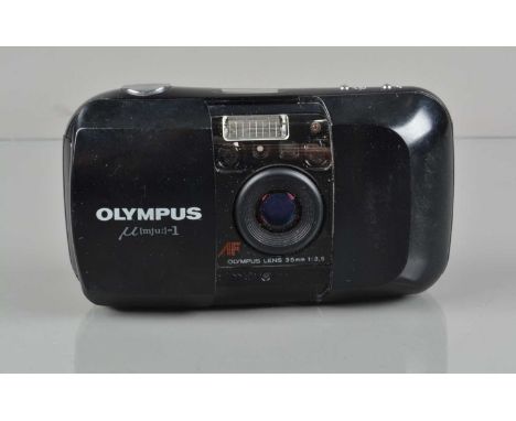 An Olympus mju-1 Compact camera, shutter working, flash working, self timer working, body G, some wear/scratches, elements G-