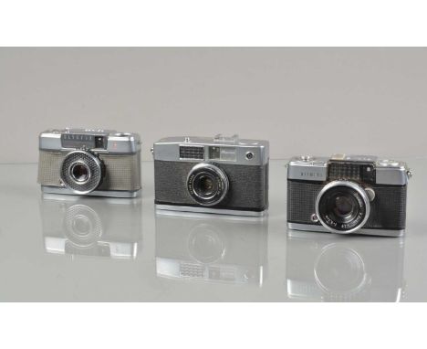 Three 35mm Half Frame Cameras, an Olympus Pen-D, shutter working, light cell responsive, body G, some wear, Pen-EE, shutter w