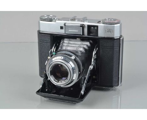 A Zeiss Ikon Super Ikonta Rangefinder Folding Camera, model 534/16, shutter working, meter responsive, rangefinder functions,