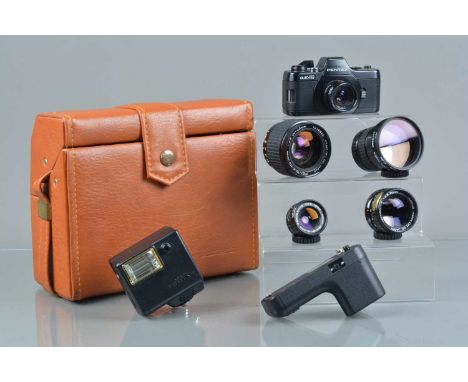 A Pentax Auto 110 Camera Outfit, shutter working, body G-VG, with 18mm f/2.8, 24mm f/2.8, 50mm f/2.8, 70mm f/2.8, 20-40mm f/2