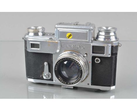 A Zeiss Ikon Contax III Rangefinder Camera, shutter not working/sticking, meter responsive, rangefinder functions, body G, re