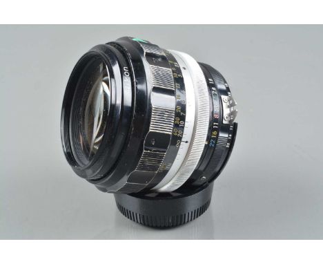 A Nikon Nikkor-H 85mm f/1.8 Ai Lens, serial no 273145, barrel G, paint wear to grip, light brassing to mount, elements G-VG