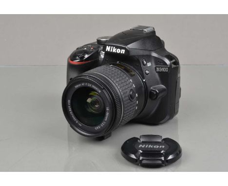 A Nikon D3400 DSLR Camera, powers up, shutter working, flash working, appears to function as should, body G, with AF-P Nikkor