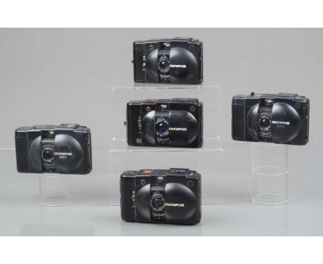 A Group of Olympus XA Compact Cameras, two XA1, light cells unresponsive, two XA2 and a XA4 Macro, all with power/shutter iss