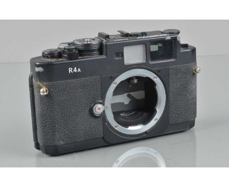 A Voigtländer Bessa R4A Rangefinder Camera Body, shutter working, meter responsive, finder clear, body G, paint wear to  edge