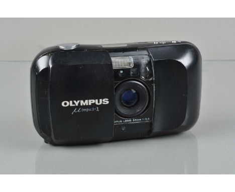 An Olympus mju-1 Quartz Date Compact camera, shutter working, flash working, self timer working, quartz date display function
