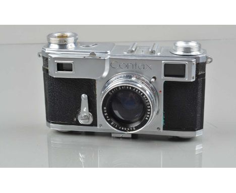 A Zeiss Ikon Contax II Rangefinder Camera, shutter working, self timer working, rangefinder functions, body G, some brassing 