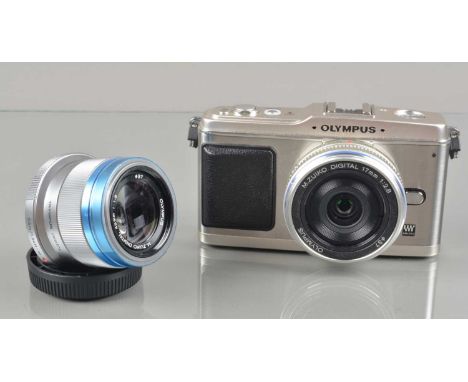 An Olympus Pen E-P1 Digital Camera, untested, body VG, with Zuiko 17mm f/2.8 &amp; M Zuiko 45mm f/1.8 lens, VG, with caps, ba