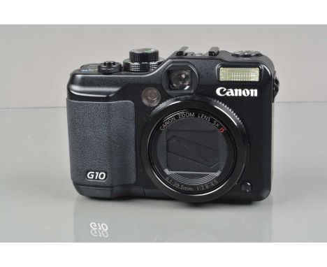 A Canon Power Shot G10 Digital Camera, untested, body G-VG, with battery, no charger, cables, in maker's box