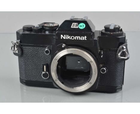 A Nikon Nikkormat EL Camera Body, black, serial no 5536649, shutter working, meter responsive, self timer working, body G, sl