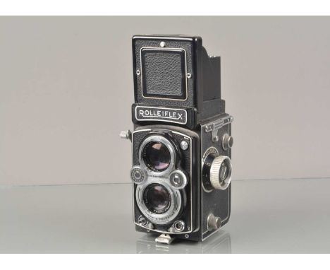 A Rolleiflex Automat MX-EVS TLR Camera,  type 2, serial no 1705065, shutter cocks, shutter leaves jammed, body G, some light 