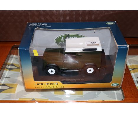A Land Rover I:18 scale model boxed