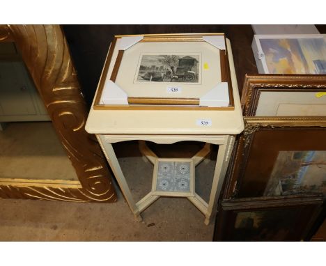 An Arts &amp; Crafts design white painted two tier occasional table with tile insert  to the base