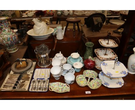 A plated Art Deco style desk stand;  a cased set of six plated teaspoons; plated fish knives and forks; two novelty table cru