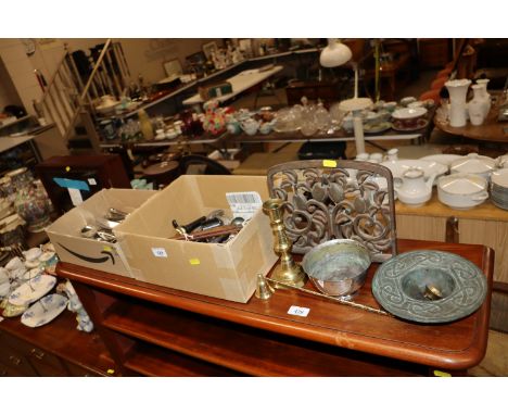 A quantity of various plated and other cutlery; brass candlestick; a book stand; candle snuffer etc.