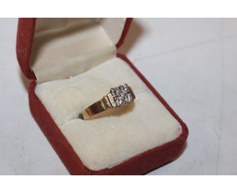 A yellow metal ring marked 585 set with diamonds, ring size Q/R, approx. total weight 4.5gms 