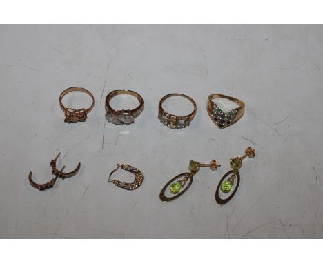 A 9ct gold ring set with two teardrop white stones and baguette white set shoulders, ring size L, 3.8gms total weight; a 9ct 