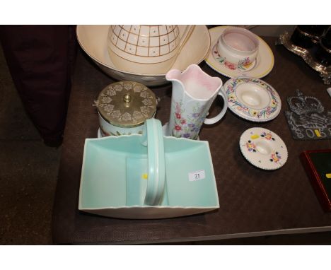 A Poole Pottery turquoise basket; a Wedgwood biscuit barrel and a Radford jug 