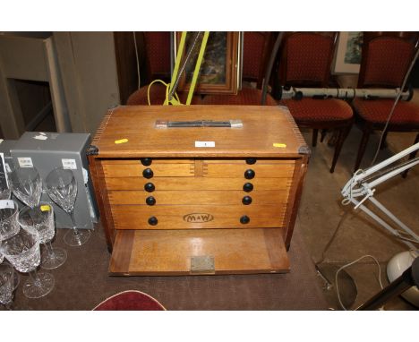 An early 20th Century mahogany multi-drawer small tool chest stamped M&W