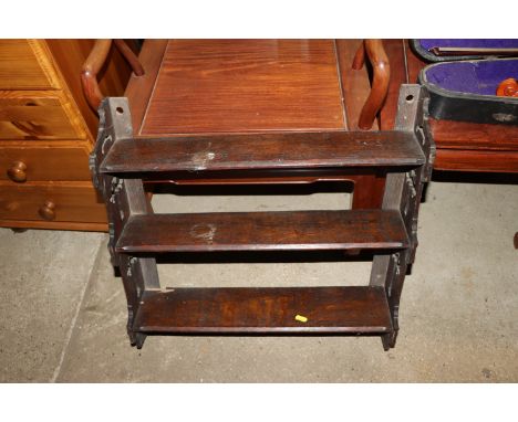A Victorian oak framed hanging wall shelf 